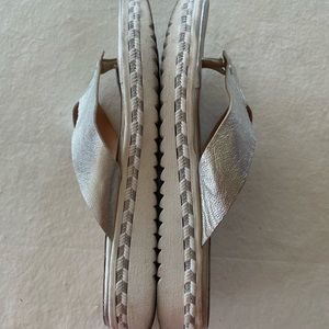 silver metallic flip flops